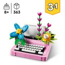 Schreibmaschine mit Blumen