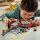 F1® Boxenstopp mit Boxencrew und Ferrari Flitzer