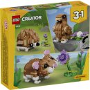 Niedlicher Hamster mit Blume