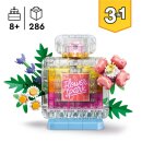 Parfümflasche mit Blumendeko