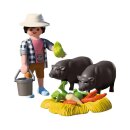 Landwirt mit Hängebauchschwein